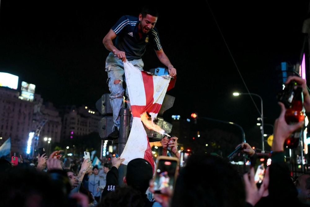 Dejected English supporters clash with police, Argentina fans after World Cup semi-final defeat