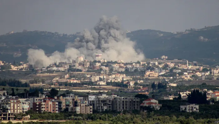 Smoke rises from the site of Israeli airstrikes that targeted the village of Rmadiyeh in the Tyre district of southern Lebanon on May 26.