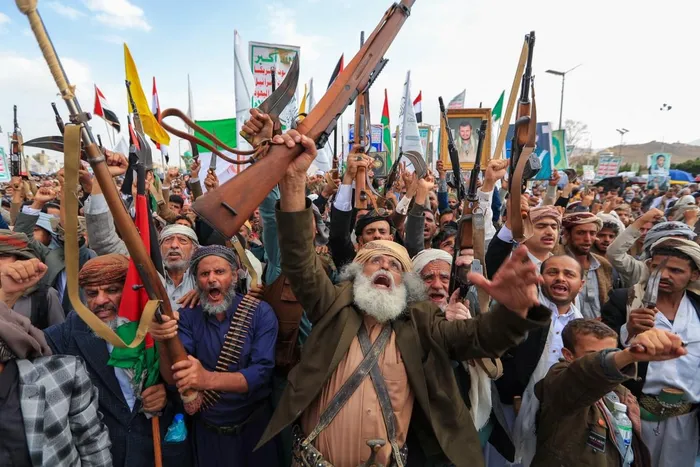 Armed Yemeni supporters of the Iran-backed Houthi movement brandish their weapons during a protest against US strikes on Iran in Sanaa on July 10, 2026.
Iran's top negotiator Mohammad Bagher Ghalibaf on July 10 said the conflict with the United States would not end with Tehran's surrender, after hostilities between the decades-old foes resumed this week with tit-for-tat attacks.