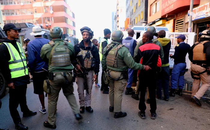Private security, accompanied by members of the SAPS, has been conducting operations in Hillbrow to check whether immigrants have the correct documentation.  