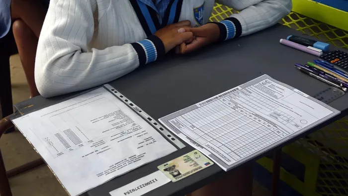Stock image of matric learner writing exams.