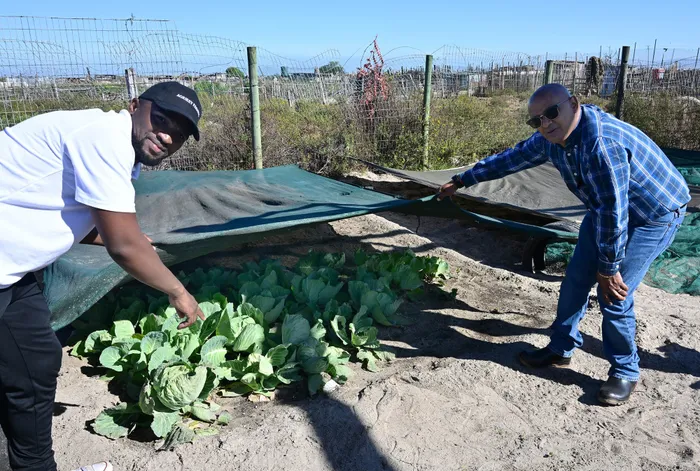 The City’s mayoral committee member for urban waste management Alderman Grant Twigg with Khaya Burwana, a beneficiary of the Expanded Public Works Programme (EPWP) Entrepreneurship Training Programme, who founded AgriKey Farming. Picture: Supplied